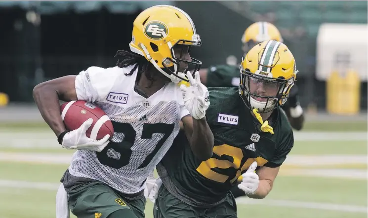  ?? DAVID BLOOM ?? Derek Walker and Jordan Hoover take part in practice this week. Players have just a few days to make an impression and secure a spot on the Eskimos roster.