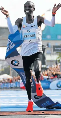  ?? REUTERS/Fabrizio Bensch Picture: ?? AT HIS OWN PACE: Kenya's Eliud Kipchoge celebrates as he wins the Berlin Marathon