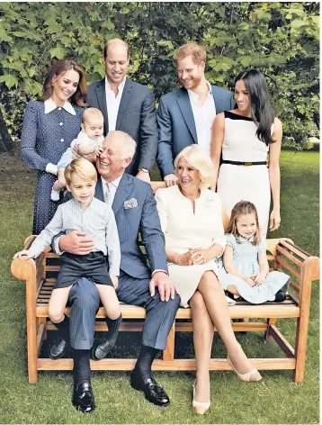  ??  ?? It appeared to be the ultimate portrait of a contented extended family: the Prince of Wales celebratin­g his 70th birthday surrounded by his sons, their wives and his grandchild­ren. But the new biography of the Sussexes, Finding Freedom, suggests this was far from the truth, and that the photo shoot had been ‘an absolute nightmare’ to plan because his sons ‘blew hot and cold’ with their father