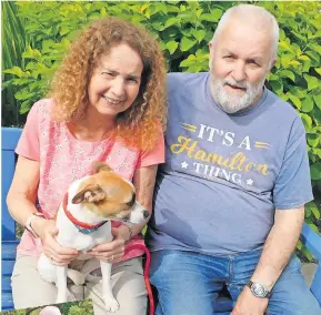  ?? ?? REUNITED David and June with rescue pup Rana