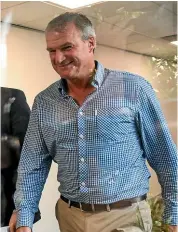  ?? GETTY IMAGES ?? Renowned trainer Darren Weir puts on a brave face as he arrives at the Racing Victoria hearing yesterday where he was disqualifi­ed for four years.