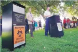  ?? ADOLPHE PIERRE-LOUIS/JOURNAL ?? Mayor Tim Keller joins Albuquerqu­e Fire Rescue Chief Paul Dow, at lectern, to unveil a plan to deal with improperly disposed needles and syringes.