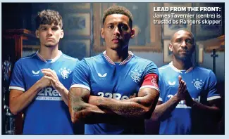  ??  ?? LEAD FROM THE FRONT: James Tavernier (centre) is trusted as Rangers skipper