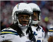  ?? AP BY STEVEN SENNE ?? Los Angeles Chargers running back Melvin Gordon watches from the sideline during the second half of an NFL divisional playoff football game against the New England Patriots in Foxborough, Mass. Gordon is officially a holdout as the Chargers get ready to begin training camp.