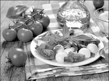  ?? PROVIDED TO CHINA DAILY ?? The traditiona­l caprese salad (pictured) is a mix of burrata cheese, tomatoes and basil, but Chrissy Teigen’s recipe switches out the leafy herb with crunchy arugula and prosciutto chips.