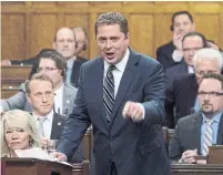  ?? SEAN KILPATRICK/THE CANADIAN PRESS ?? Tory Leader Andrew Scheer slammed Justin Trudeau over a new swing set, even though the prime minister paid for it himself.