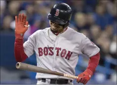  ?? FRED THORNHILL - THE ASSOCIATED PRESS ?? Boston Red Sox’s Mookie Betts reacts after popping out in the third inning against the Toronto Blue Jays in a baseball game Thursday, Sept. 12, 2019, in Toronto.