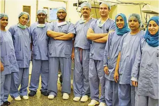  ??  ?? EXPERT TEAM: The surgical team was headed by Dr. Mohammed bin Jaafar Al Sagwani, senior consultant and head of paediatric surgery, and Dr. Mohamed Al Metwally, paediatric surgeon.