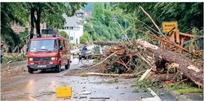  ?? FOTO: HARALD TITTEL/DPA ?? Andauernde Regenfälle haben in vielen Orten große Schäden verursacht.
