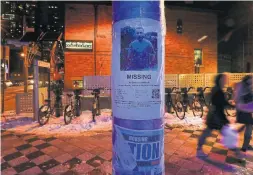  ?? RICHARD LAUTENS/TORONTO STAR ?? A poster of Andrew Kinsman, who went missing in June 2017. Missing posters in the area were always replaced as family and friends of the missing never gave up.