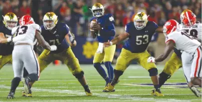  ?? | AP ?? Notre Dame quarterbac­k Brandon Wimbush will be short of receiving targets Monday against LSU in the Citrus Bowl.