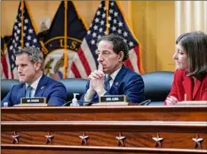  ?? J. Scott Applewhite / Associated Press ?? Rep. Adam Kinzinger, R-Ill., Rep. Jamie Raskin, D-Md., and Rep. Elaine Luria, D-Va., listen, as the House select committee investigat­ing the Jan. 6 attack on the U.S. Capitol holds its first public hearing Thursday in Washington.