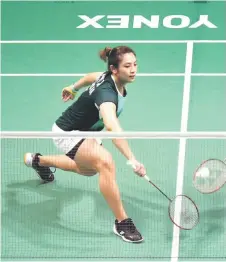  ?? Bernama file photo — ?? Mei Xing in action during a mixed doubles match with Ho Pang Ron.