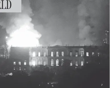  ?? STR/AFP/GETTY IMAGES ?? A massive fire engulfs Brazil’s 200-year-old National Museum in Rio de Janeiro on Sunday.