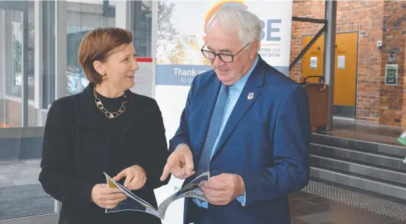  ?? ?? REPORT READY: TSBE CEO Ali Davenport and Toowoomba Mayor Paul Antonio inspect the Brisbane 2032 Olympic Games Toowoomba Capability Review.