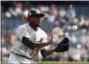  ?? CARLOS OSORIO — THE AP ?? Oakland Athletics starting pitcher Edwin Jackson catches the sacrifice popup hit by Detroit Tigers’ Dixon Machado during the fifth inning of a baseball game, Monday in Detroit.