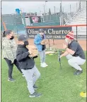  ?? COURTESY PHOTO ?? Former Los Gatos High School baseball player Hunter Bigge, right, who plays in the Chicago Cubs’ minor league system, volunteers at a Grind to Shine baseball camp hosted by the Boys & Girls Clubs of Silicon Valley at Excite Ballpark in San Jose.