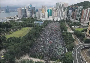  ?? AP ?? A pro-democracy rally at Victoria Park in Hong Kong yesterday. Protesters have demanded the resignatio­n of the city’s chief executive and the holding of democratic elections