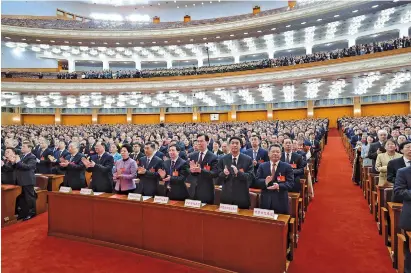  ?? ?? The 14th National People’s Congress, China’s top legislatur­e, held the closing meeting of its second session at the Great Hall of the People in Beijing yesterday. — CFP
