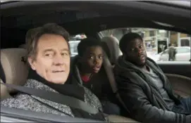  ?? DAVID LEE — STXFILMS VIA AP ?? This image released by STXfilms shows Bryan Cranston, from left, Jahi Di’Allo Winston, and Kevin Hart in a scene from “The Upside.”