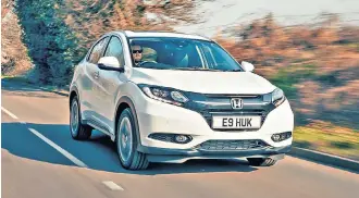  ?? ?? iA Honda HR-V features a clever rear seating set-up that frees extra luggage space