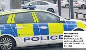  ??  ?? Harassment claims Lynne Brockett posted this picture on Facebook of a police car outside her shop