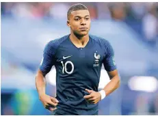  ?? FOTO: AP/DAVID VINCENT ?? Erfolgreic­h im Nike-Outfit: Der Franzose Kylian Mbappe hat sich auf der WM-Bühne zum Star entwickelt.