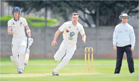  ?? Ian Potts. ?? Forfarshir­e bowler Bill Kruip fields from his own bowling while Heriots batsman Peter Ross looks on.