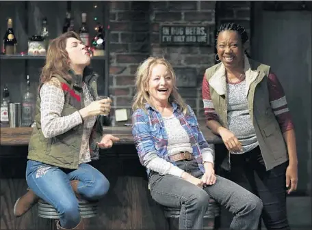  ?? Luis Sinco Los Angeles Times ?? JESSIE (AMY PIETZ), from left, Tracey (Mary Mara) and Cynthia (Portia) are regulars at the Reading, Pa., bar where “Sweat” is set.