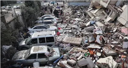  ?? ADEM ALTAN - GETTY IMAGES ?? Damage in Kahramanma­ras, close to the quake’s epicenter, the day after an earthquake struck Turkey’s southeast.