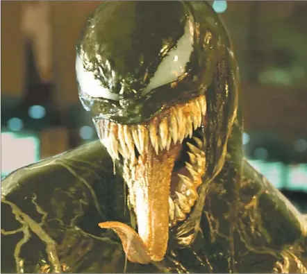  ?? Sony Pictures ?? AFTER he’s paired with an alien symbiote, Eddie regularly becomes Venom, a toothy monster hungry to snap off its enemies’ heads.