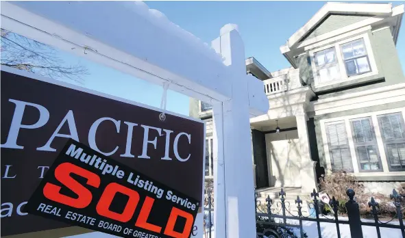  ?? — THE CANADIAN PRESS FILES ?? A year after B.C.’s Liberal government implemente­d a foreign buyers tax to quell skyrocketi­ng housing prices, there remains questions about the policy’s impact as the benchmark cost of a residentia­l property in the region surpassed $1 million in July.