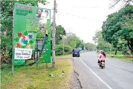  ??  ?? A UNP cutout damaged in Lunugamveh­era. Pic by Indika Handuwala