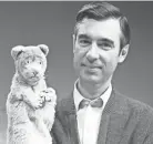  ?? FOCUS FEATURES ?? Fred Rogers and puppet Daniel Tiger from his show "Mr. Rogers Neighborho­od" in the documentar­y "Won't You Be My Neighbor?"