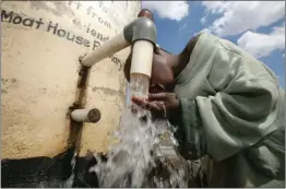  ?? ?? Zimbabwe's sewage system is overwhelme­d and many residents complain of inadequate clean, potable water