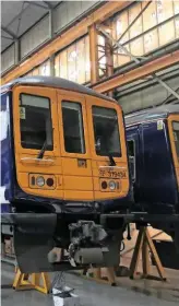  ?? RICHARD CLINNICK. ?? Porterbroo­k’s Class 769 Flex bi-mode units are being converted from redundant Class 319 electric multiple units. On August 15 2017, Northern 319434 stands inside Brush Traction (Loughborou­gh). This is unit two in the Flex programme.