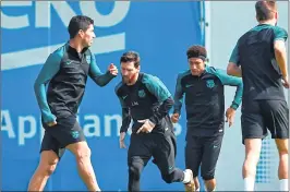  ??  ?? (From L) Barcelona's Uruguayan forward Luis Suarez, Argentinia­n forward Lionel Messi, Brazilian forward Neymar and defender Gerard Pique take part in a training session at the Joan Gamper Sports Center in Sant Joan Despi, near Barcelona.