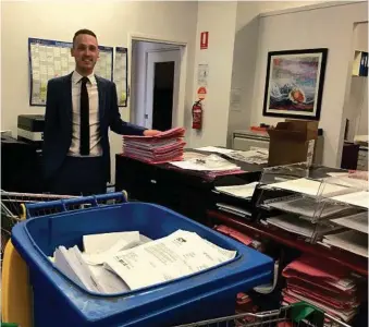  ?? PHOTO: SUPPLIED ?? TAKING A STAND: Sovereign Property Partners’ Tristan Hudson is doing his part to keep paper usage to a minimum in their Middle Ridge office.