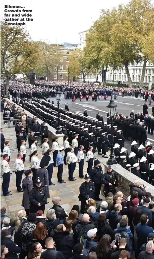  ?? ?? Silence... Crowds from far and wide gather at the Cenotaph