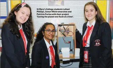  ??  ?? St Mary’s College students Leilani Phillips, Senuri Wickramara­tne and Patricia Purina with their project ‘Saving the planet one flush at a time’.