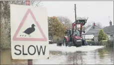  ?? PICTURES: PA/GETTY ?? OUR CHANGING WORLD: Fires on Saddlewort­h Moor and serious flooding in Fishlake have been among the biggest stories of the past few years.