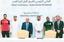  ??  ?? Officials from Shabab Al Ahli Dubai and Azizi during the signing of the strategic partnershi­p agreement.