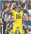  ?? GETTY IMAGES ?? Rams quarterbac­k Jared Goff celebrates his touchdown run in the third quarter Monday.