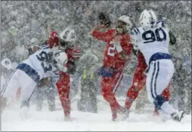  ?? ADRIAN KRAUS - THE ASSOCIATED PRESS ?? File-This Dec. 10, 2017, file photo shows Buffalo Bills quarterbac­k Nathan Peterman, second from right, throwing during the first half of an NFL football game against the Indianapol­is Colts in Orchard Park, N.Y. BEST GAME SCENE (special award):...