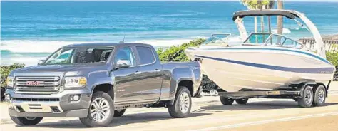  ?? GMC photos ?? The all-new 2015 GMC Canyon Extended Cab pickup truck tester was surprising­ly powerful given its fourcylind­er engine. The truck is rated to haul 1,450 pounds and tow up to 3,500 pounds.