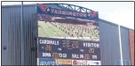  ??  ?? Farmington’s 2020 graduation ceremony was livestream­ed and also shown on the stadium’s screen for all to see. The scoreboard also was set in honor of the Class of 2020 with the timeclock set at 20:20, the score at 20 to 20 with 20 downs to go and the ball on the 20-yard line.