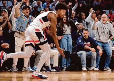  ?? Sarah Stier/Getty Images ?? UConn’s Jaylin Stewart reacts after scoring in the second half against Marquette during the Big East Tournament final at Madison Square Garden on Saturday.