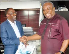  ??  ?? Newly appointed Managing Director of Nigeria Airspace Management Agency (NAMA), Capt. Fola Akinkuotu (left), receives handover note from outgoing Ag. MD, Engr. Emma Anasi at the agency headquarte­rs in Lagos, Friday