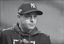  ?? MATT SLOCUM/AP PHOTO ?? In this Oct. 19, 2019 file photo, New York Yankees manager Aaron Boone watches batting practice before Game 6 of the ALCS against the Houston Astros in Houston.