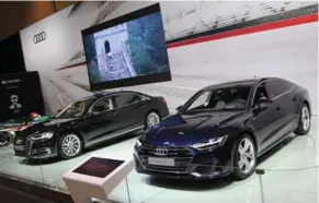  ?? JONATHAN YARKONY FOR THE TORONTO STAR ?? The 2019 Audi A7 and A8 are on display at the Canadian Internatio­nal AutoShow. Both are powered by the same 340-hp 3.0-litre V6 turbo paired with the brand’s Quattro allwheel drive.